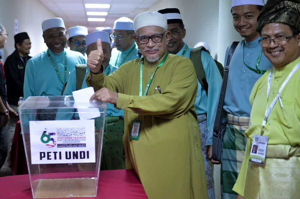 Datuk Seri Abdul Hadi Awang casts his vote during PAS’ central committee election at Muktamar 2019 in Kuantan June 21, 2019. — Picture by Mukhriz Hazim