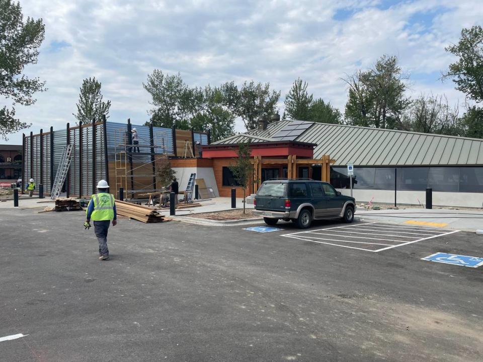 Workers continue remodeling the future Ling & Louie’s Asian Bar and Grill on a recent weekday.