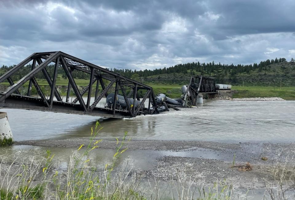 The bridge collapse with the train in the river. / Credit: Stillwater County DES