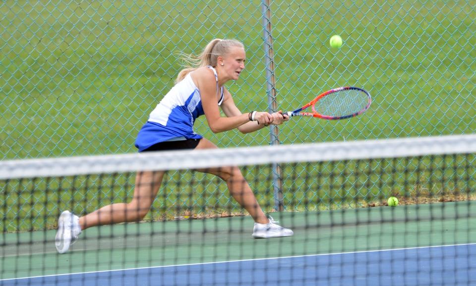 Williamsport's Lauren Toms hustles to return a shot to Brunswick's Keira McDonald during the girls singles final of the 1A West Region II championships at Boonsboro on May 20. Toms won 1-6, 6-3, 10-8 to earn a state tournament berth.