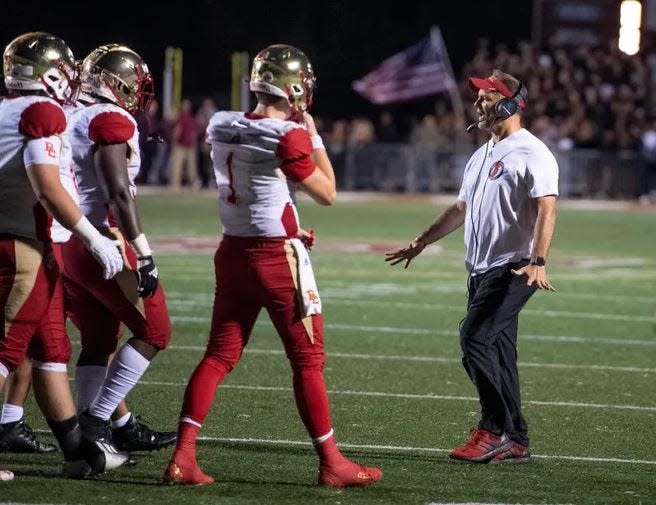 Bergen Catholic football coach Vito Campanile talks to his players during a game vs. Don Bosco on Friday, September 24, 2021.  (Michael Karas/NorthJersey.com)