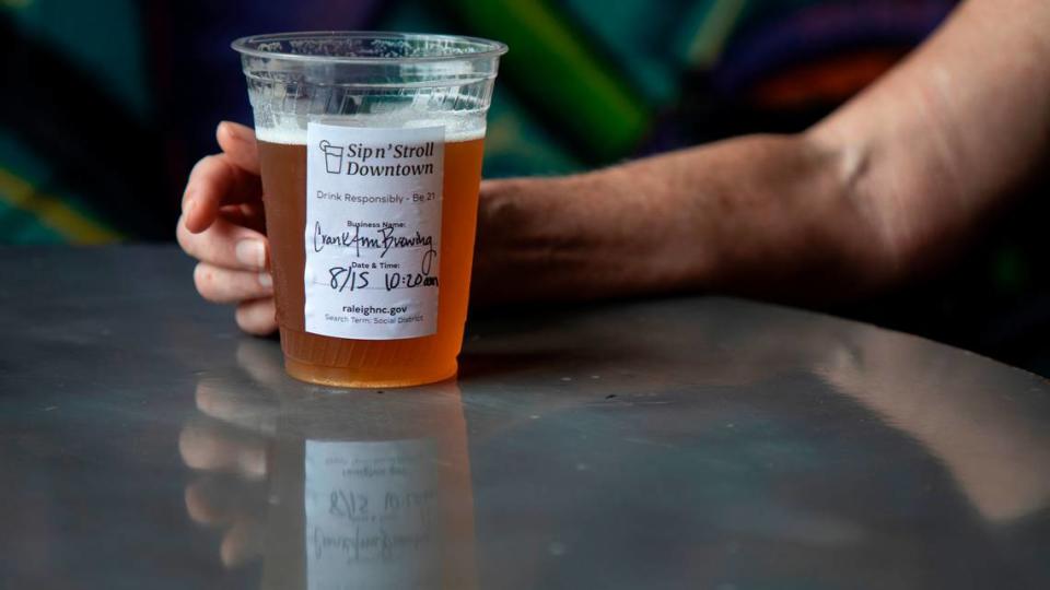 A sticker marks a social district drink at Crank Arm Brewing Company on Monday, August 15, 2022, in Raleigh, N.C.