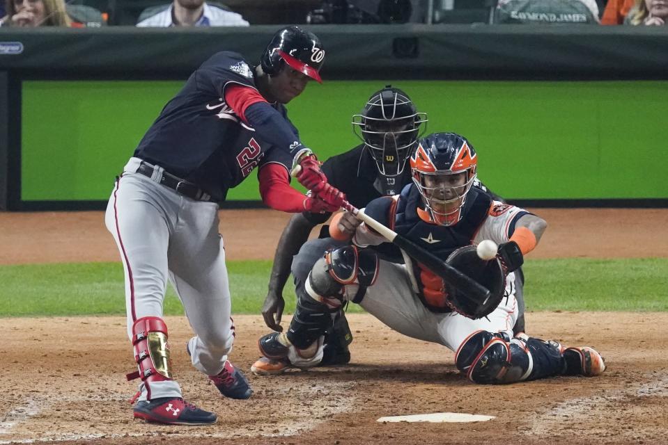 Washington Nationals' Juan Soto hits a two-run scoring double during the fifth inning of Game 1 of the baseball World Series against the Houston Astros Tuesday, Oct. 22, 2019, in Houston.(AP Photo/Eric Gay)