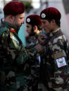 Fighters of National army, backed by Turkey, are seen during a graduation ceremony in the city of al-Bab, Syria August 5, 2018. REUTERS/Khalil Ashawi