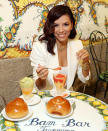 <p>Eva Longoria digs into a sweet treat at Bam Bar while in town for the Taormina Film Fest in Italy on June 29.</p>