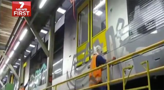 Two vandals dress as train network employees. Image: 7News