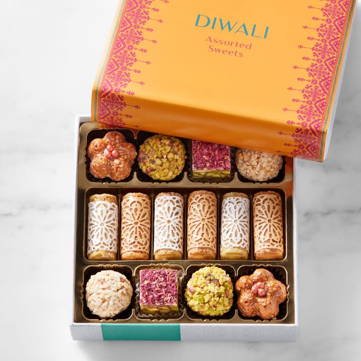 <p><a href="https://go.redirectingat.com?id=74968X1596630&url=https%3A%2F%2Fwww.williams-sonoma.com%2Fproducts%2Fdiwali-celebration-assorted-sweets&sref=https%3A%2F%2Fwww.womansday.com%2Flife%2Fg41021725%2Fdiwali-gift-ideas%2F" rel="nofollow noopener" target="_blank" data-ylk="slk:Shop Now;elm:context_link;itc:0;sec:content-canvas" class="link ">Shop Now</a></p><p>Diwali Celebration Assorted Sweets</p><p>williams-sonoma.com</p><p>$39.95</p><span class="copyright">Williams Sonoma</span>