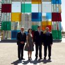 (L-R) Malaga's Mayor Francisco de la Torre, French Culture Minister Fleur Pellerin, Spain's Prime Minister Mariano Rajoy and Centre Pompidou President Alain Seban pose for photographers in front of the Cube after attending the opening ceremony of the Malaga branch of the Centre Pompidou in Malaga, southern Spain March 28, 2015. REUTERS/Jon Nazca