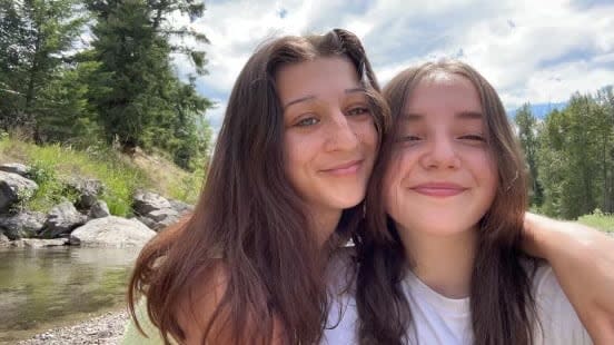 Destiny Paul, right, and her girlfriend, Sitarah Buksh, both reported being bullied for their sexual orientation at a secondary school in Barriere, B.C., over the past year. (Submitted by Starrlyn Muzyka - image credit)