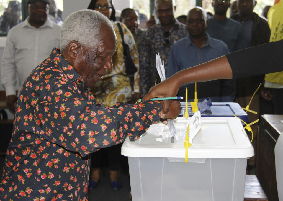 An elderly man casts his vote in Maputo, Tuesday, Oct. 15, 2019, in the country's presidential, parliamentary and provincial elections. Polling stations opened across the country with 13 million voters registered to cast ballots in elections seen as key to consolidating peace in the southern African nation. (AP Photo/Ferhat Momade)