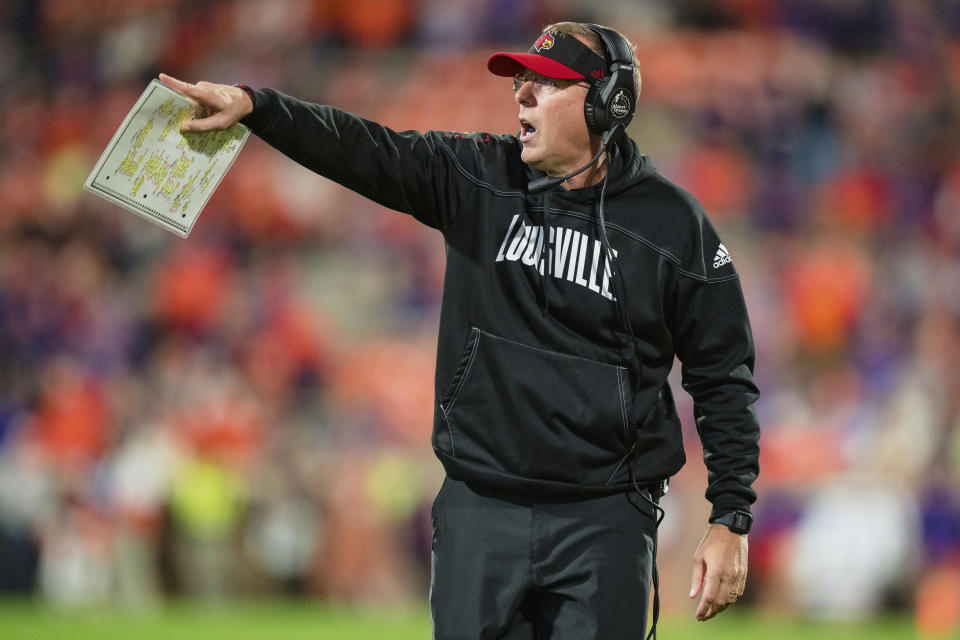 Louisville head coach Scott Satterfield looks on in the second half of an NCAA college football game against Clemson, Saturday, Nov. 12, 2022, in Clemson, S.C. (AP Photo/Jacob Kupferman)