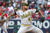 Oakland Athletics starting pitcher Frankie Montas throws to a Los Angeles Angels batter during the first inning of a baseball game in Anaheim, Calif., Friday, May 20, 2022. (AP Photo/Alex Gallardo)