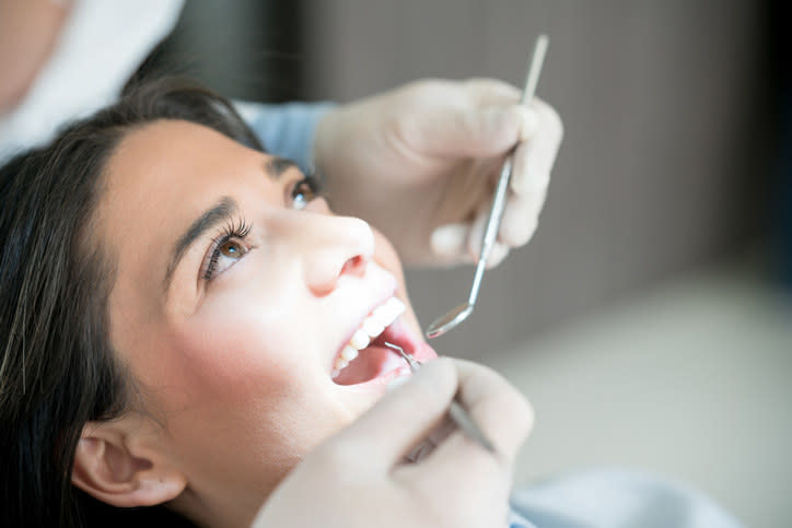 Dentist examining a patient