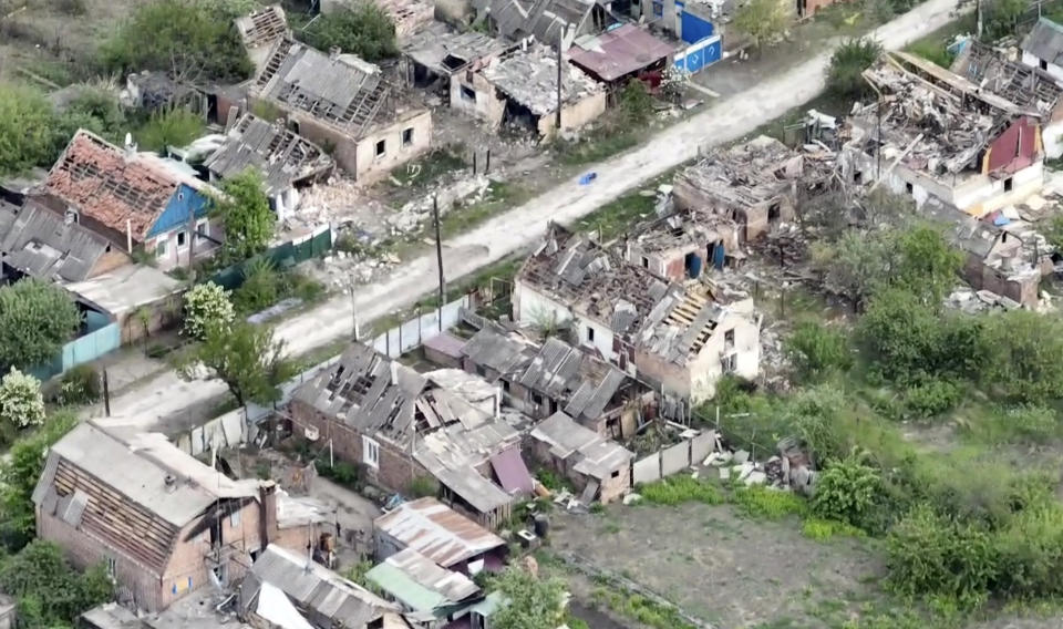 This drone footage obtained by The Associated Press shows the village of Ocheretyne, a target for Russian forces in the Donetsk region of eastern Ukraine. Ukraine’s military has acknowledged the Russians have gained a “foothold” in Ocheretyne, which had a population of about 3,000 before the war, but say fighting continues. No people could be seen in the footage, and no building in Ocheretyne appeared to have been left untouched by the fighting. (Kherson/Green via AP)