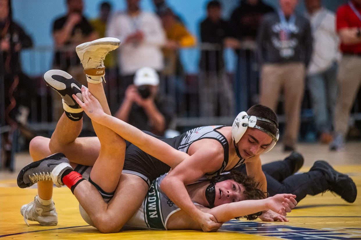 Briarcliff-Byram Hills-Valhalla-Westlake's Vincenzo Mannello, top, wrestles Yorktown's Giovanni Tornambe in the 101 pound weight class title during the Section 1 division 1 wrestling championship in White Plains, NY on Sunday, February 11, 2024.