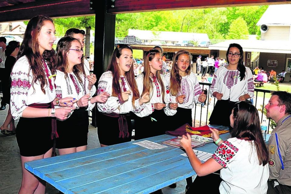 Children, dressed in their cultural clothing, sing a patriotic song called "Chervona Ruta" at the Ukrainian Youth Resort in Ellenville in this file photo.