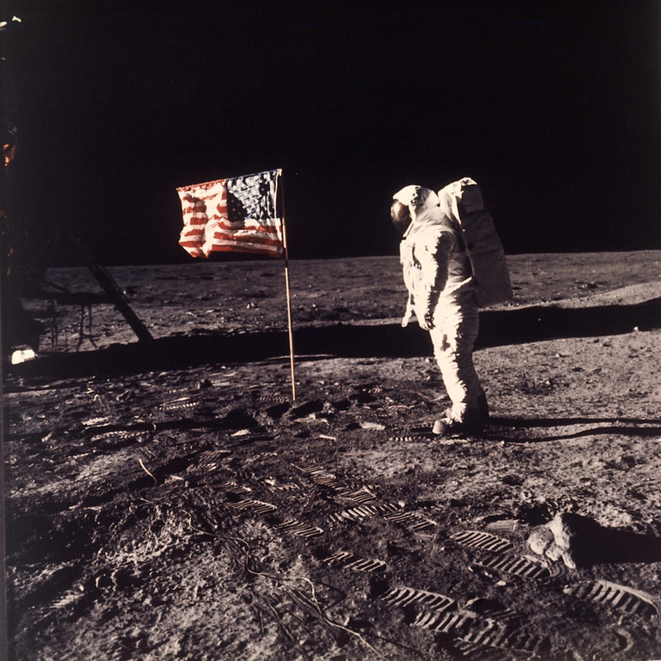 FILE - This July 20, 1969 file photo released by NASA shows astronaut Edwin E. "Buzz" Aldrin Jr. posing for a photograph beside the U.S. flag deployed on the moon during the Apollo 11 mission. Aldrin and fellow astronaut Neil Armstrong were the first men to walk on the lunar surface. Sony Electronics and the Nielsen television research company collaborated on a survey ranking TV's most memorable moments. Other TV events include, the Sept. 11 attacks in 2001, Hurricane Katrina in 2005, the O.J. Simpson murder trial verdict in 1995 and the death of Osama bin Laden in 2011. (AP Photo/NASA/Neil A. Armstrong, file)