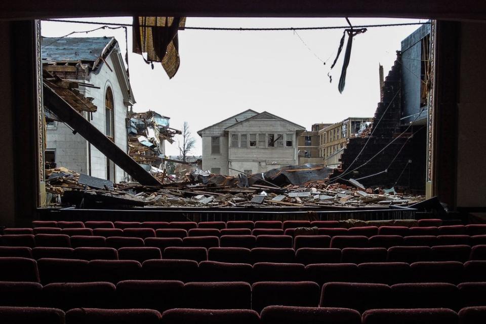What remains of the Legion Theatre in Mayfield, Kentucky, on 16  December, following a tornado that hit five midwestern US states, killing nearly 80 in Kentucky alone. (AFP via Getty Images)
