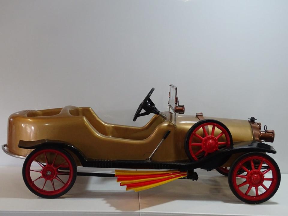 The rare 1960s Chitty Chitty Bang Bang child’s pedal car was made by Pines factory and is estimated to fetch £1,000-£1,500 (Excalibur Auctions/PA)