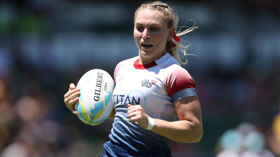 Ellie Boatman runs in a try for Great Britain against South Africa