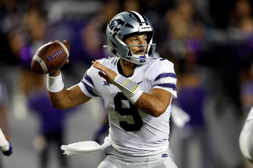 Kansas State quarterback Adrian Martinez (9) throws a pass against TCU last season at Amon G. Carter Stadium in Fort Worth, Texas.