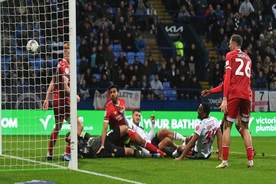 Cameron Jerome forces  Bolton's first goal over the line against Shrewsbury <i>(Image: Camerasport)</i>