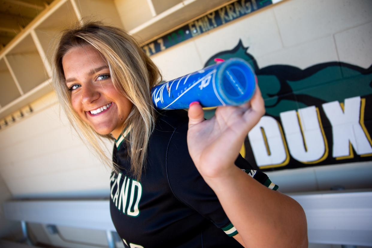 Zeeland West's Carly Sleeman poses for a photo in the Dux dugout Tuesday, June 28, 2022, at Zeeland West's softball field. Sleeman has been named The Sentinel's co-softball player of the year alongside Hamilton's Madie Jamrog. NOTE: Jamrog was unavailable for photoshoot