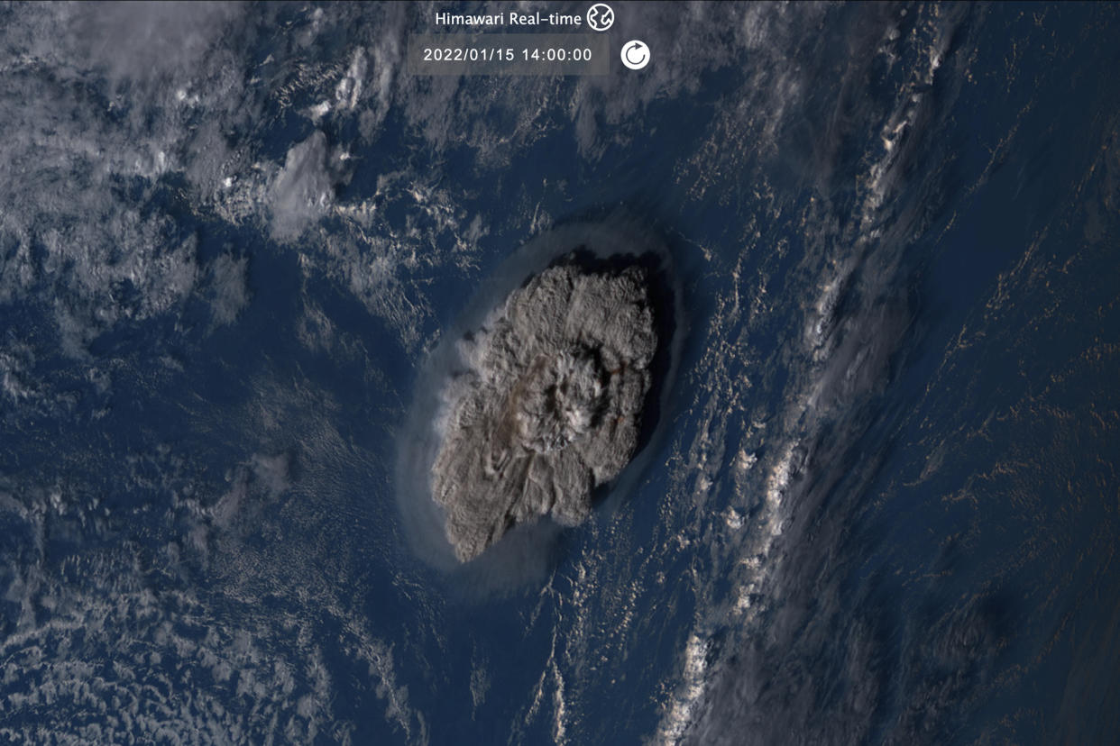 This satellite image taken by Himawari-8, a Japanese weather satellite operated by Japan Meteorological Agency and released by National Institute of Information and Communications Technology (NICT), shows an undersea volcano eruption at the Pacific nation of Tonga Saturday, Jan. 15, 2022. (NICT via AP)