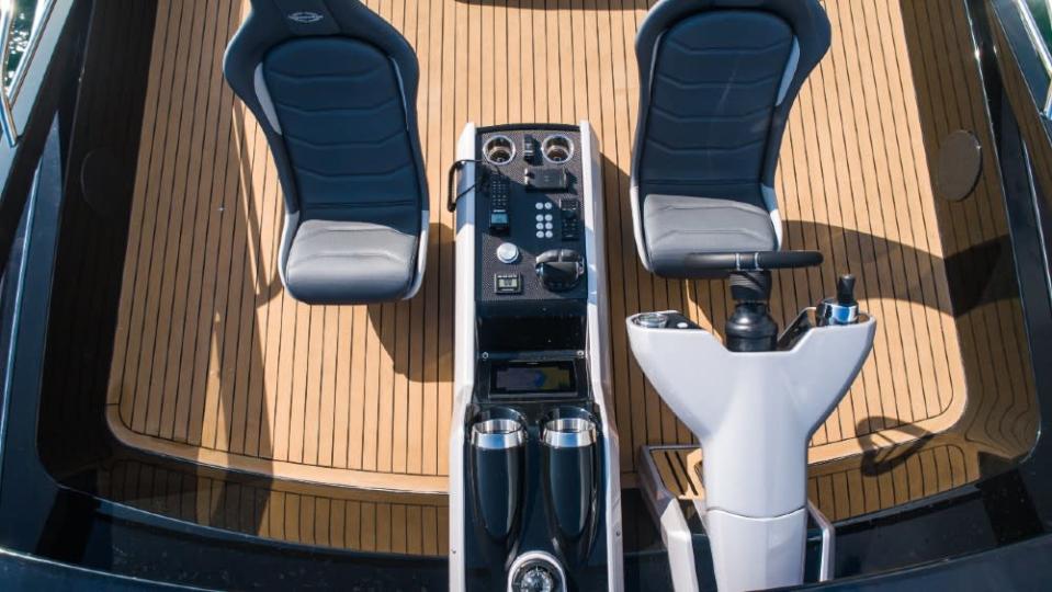 The new Sky Helm with the low, form-fitting seats and tilt wheel, turns a 65-foot yacht into a sport boat. - Credit: Courtesy Sunseeker Yachts