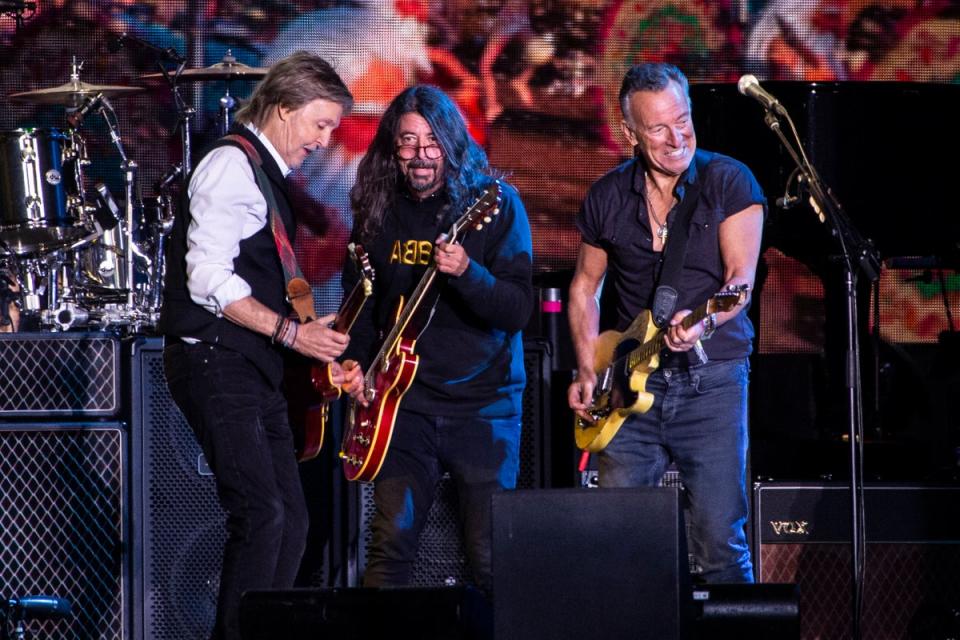 Paul McCartney, from left, Dave Grohl and Bruce Springsteen perform (Joel C Ryan/Invision/AP)