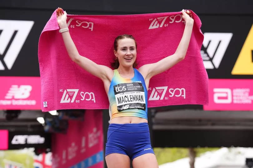 Mhairi Maclennan reacts after finishing the women's elite race and breaking the women's record