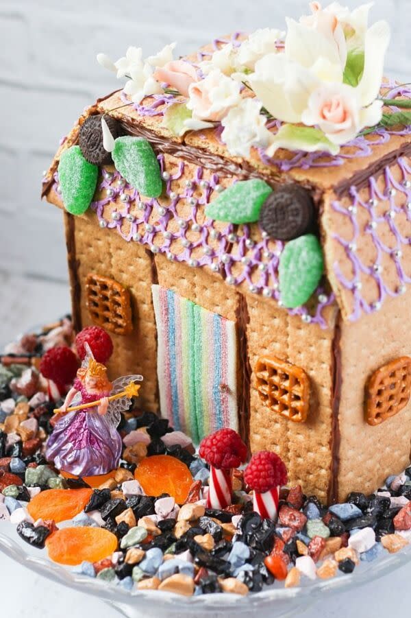 <p>No magic needed to make this house fit for a fairy — just some graham crackers and a fruit rollup.<br><br><em><a href="https://sugarspiceandglitter.com/edible-fairy-house/" rel="nofollow noopener" target="_blank" data-ylk="slk:See more at Sugar, Spice and Glitter »;elm:context_link;itc:0;sec:content-canvas" class="link ">See more at Sugar, Spice and Glitter »</a></em></p>