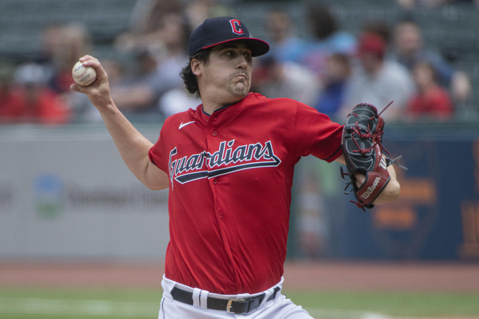 Cleveland Guardians starting pitcher Cal Quantrill delivers against the Minnesota Twins during the first inning of a baseball game in Cleveland, Sunday, May 7, 2023. (AP Photo/Phil Long)