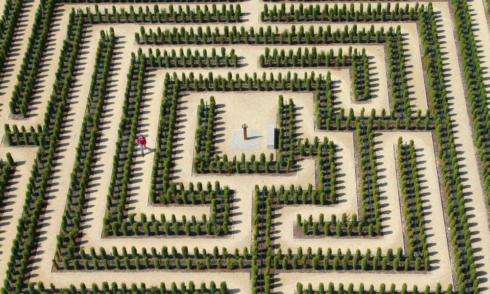 Illustration of a man walks through a labyrinth