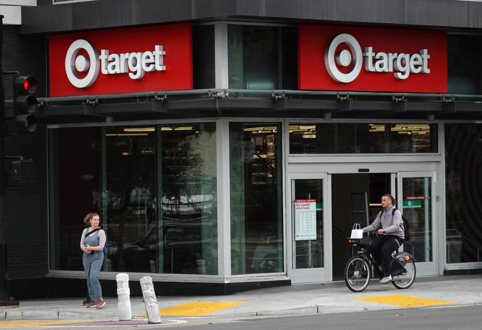 OAKLAND, CALIFORNIA - SEPTEMBER 29: A cyclist rides by a Target store that is slated for closure on September 29, 2023 in Oakland, California. Citing “theft and organized retail crime,