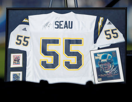 FILE PHOTO: A No.55 jersey is seen on display at Qualcomm Stadium as part of a "Celebration of Life" memorial, held in memory of former San Diego Chargers and NFL linebacker Junior Seau in San Diego, California May 11, 2012. REUTERS/Mike Blake/File Photo