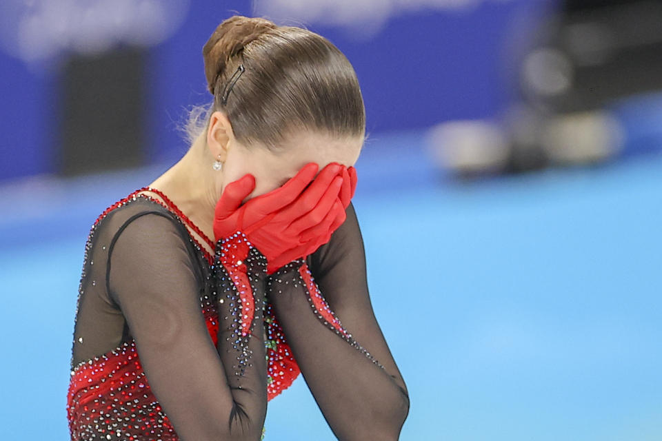 BEIJING, CHINA - FEBRUARY 17: Kamila Valieva of ROC reacts to her score after the Women Single Skating Free Skating on day thirteen of the Beijing 2022 Winter Olympic Games at Capital Indoor Stadium on February 17, 2022 in Beijing, China. (Photo by Nikolay Muratkin/Anadolu Agency via Getty Images)