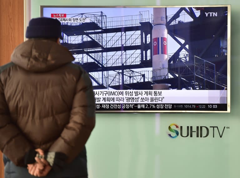 A TV broadcasts file footage of North Korea's Unha-3 rocket launch in 2012 during a news report on the North's planned rocket launch, in Seoul on February 3, 2016