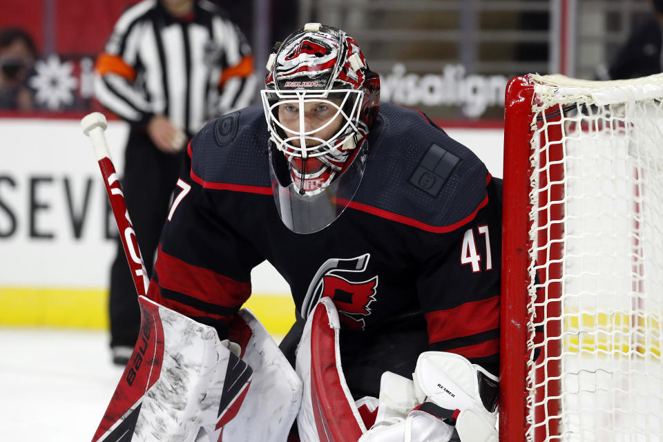 Carolina Hurricanes goaltender James Reimer watches the puck during the third period of the team's NHL hockey game against the Dallas Stars in Raleigh, N.C., Saturday, Jan. 30, 2021. (AP Photo/Karl B DeBlaker)