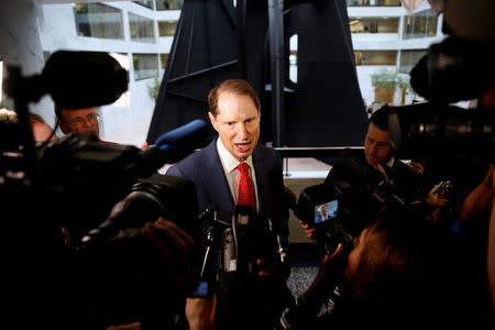 FILE PHOTO: Senator Ron Wyden (D-OR) arrives for a Senate Intelligence Committee hearing on Capitol Hill in Washington, U.S., May 16, 2018. REUTERS/Joshua Roberts