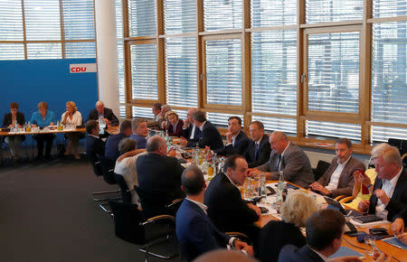 Annegret Kramp-Karrenbauer, German Chancellor Angela Merkel, Julia Kloeckner and Volker Bouffier attend a Christian Democratic Union (CDU) leadership meeting in Berlin, Germany July 1, 2018. REUTERS/Axel Schmidt