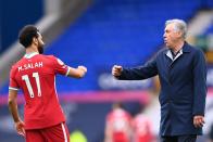 Liverpool's Egyptian midfielder Mohamed Salah (L) and Everton's Italian head coach Carlo Ancelotti react at the final whistle during the English Premier League football match between Everton and Liverpool at Goodison Park in Liverpool, north west England on October 17, 2020. (Photo by Laurence Griffiths / POOL / AFP) / RESTRICTED TO EDITORIAL USE. No use with unauthorized audio, video, data, fixture lists, club/league logos or 'live' services. Online in-match use limited to 120 images. An additional 40 images may be used in extra time. No video emulation. Social media in-match use limited to 120 images. An additional 40 images may be used in extra time. No use in betting publications, games or single club/league/player publications. / (Photo by LAURENCE GRIFFITHS/POOL/AFP via Getty Images)