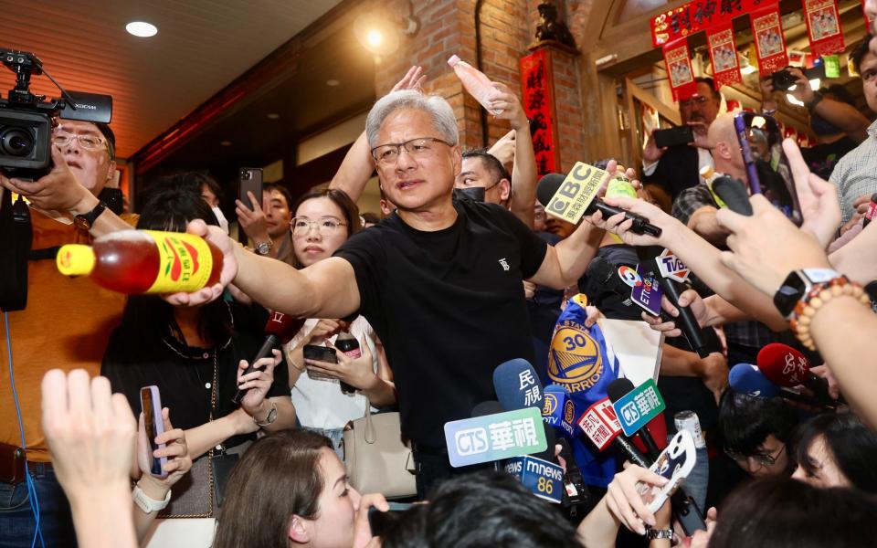 NVIDIA's founder and CEO Jensen Huang speaking to the press at a night market in Taipei