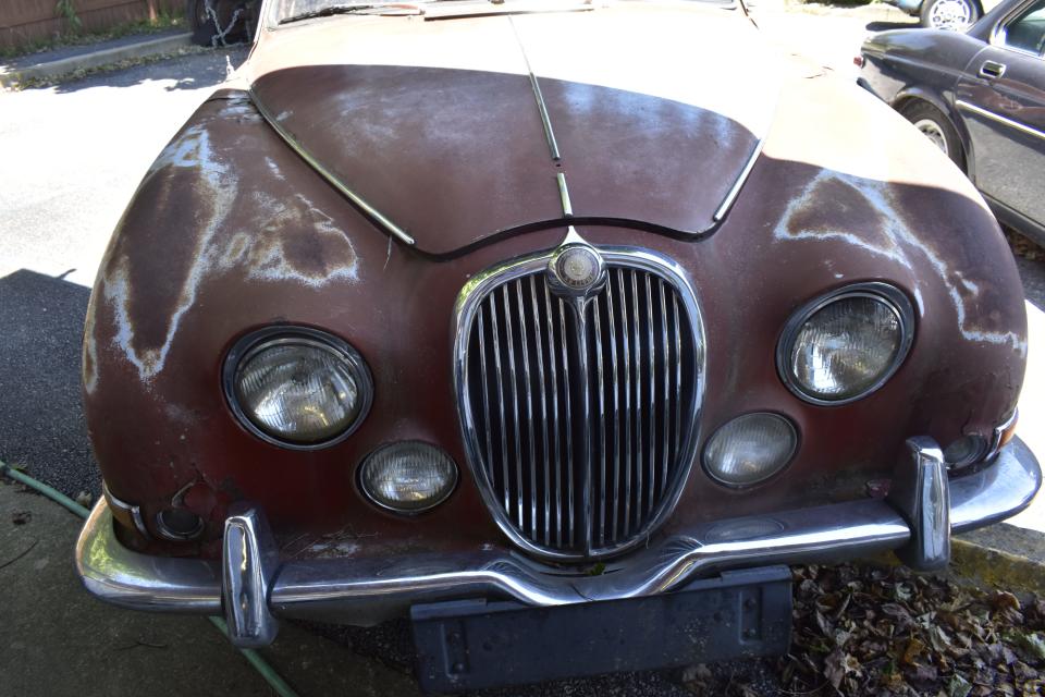 Seen in Harrodsburg, a fading 1966 Jaguar