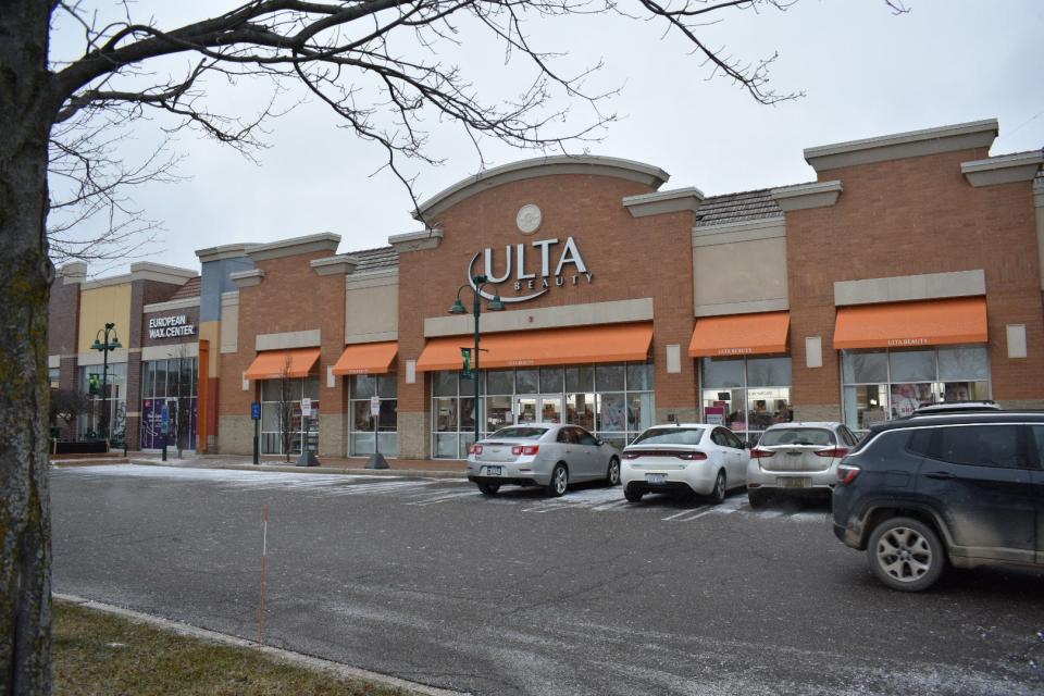 The scene of a shooting the day after and what police said was an organized retail fraud outside the Ulta Beauty store at the Green Oak Village Place mall on Thursday, Jan. 12, 2023.