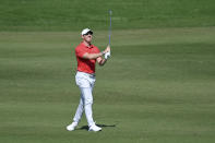 Rory McIlroy, of Northern Ireland, watches his second shot on the first hole during final round of the CJ Cup golf tournament, Sunday, Oct. 17, 2021, in Las Vegas. (AP Photo/David Becker)