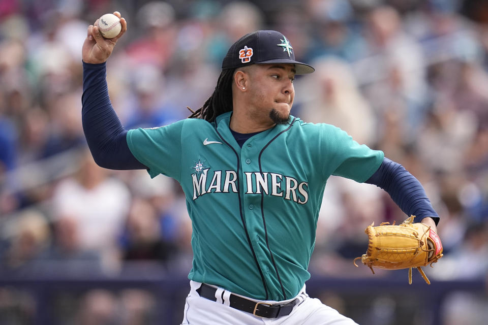 Seattle Mariners starting pitcher Luis Castillo delivers during the first inning of a spring training baseball game against Chicago Cubs, Monday, March 6, 2023, in Peoria, Ariz. (AP Photo/Abbie Parr)