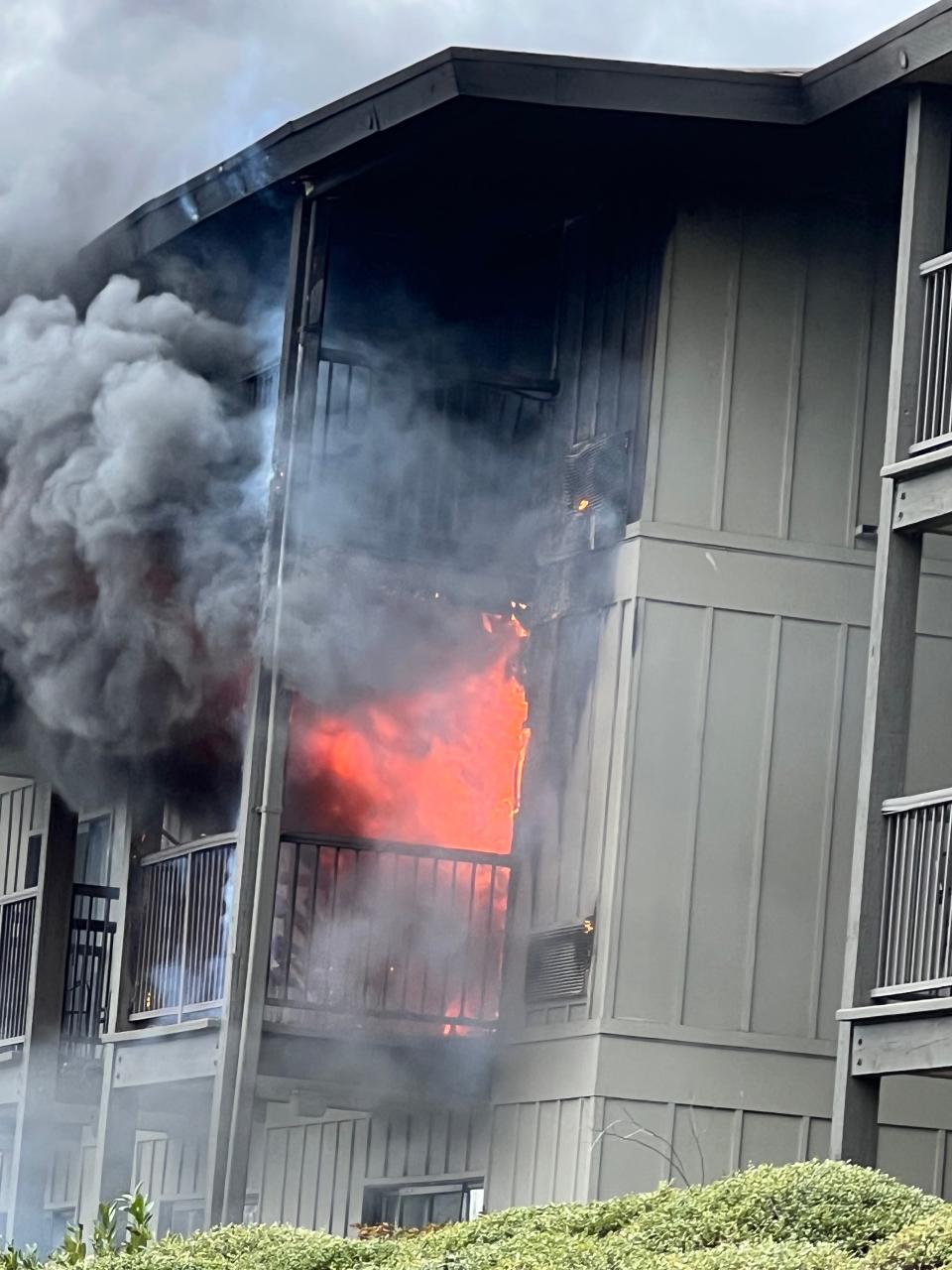 Stacy Barkley, who was visiting Eugene, Oregon, from Deerfield, Illinois, took a photo of the burning hotel room next to the room jogger Greg Spike helped her escape via the balcony on Feb. 28, 2023.