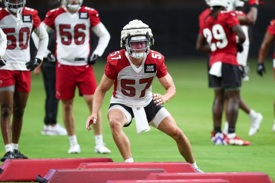 Arizona Cardinals inside linebacker Nick Vigil (57) runs a drill during Arizona Cardinals practice at State Farm Stadium on Friday, July 29, 2022, in Glendale.