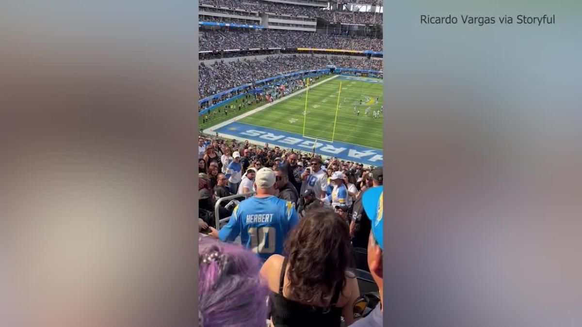 Video: Chargers fan clobbers Raiders fan at SoFi Stadium